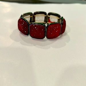 Red dazzling stretch band bracelet.